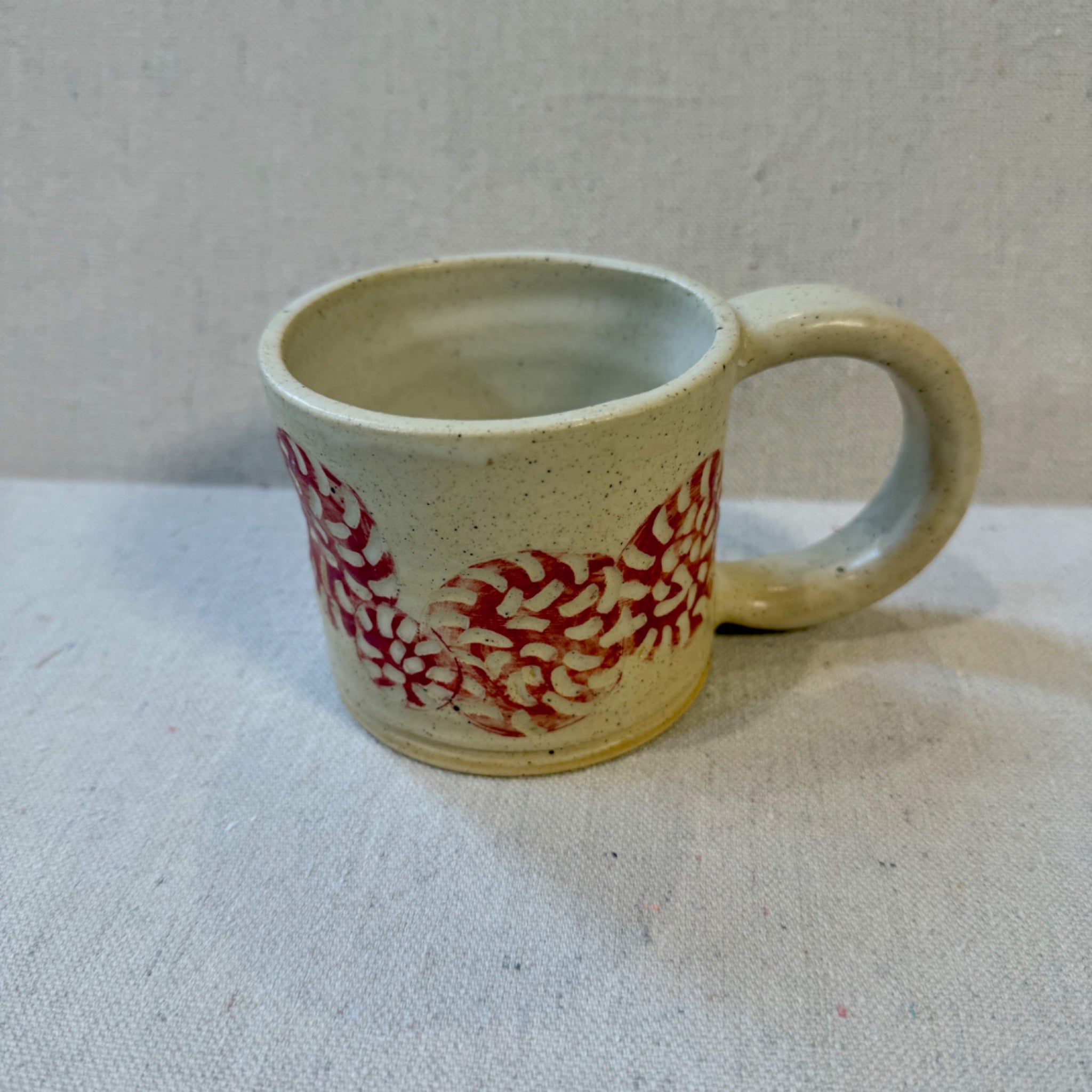 66f602447ebd947855ec7dbc_cup-with-red-carving_1763744023821.jpg